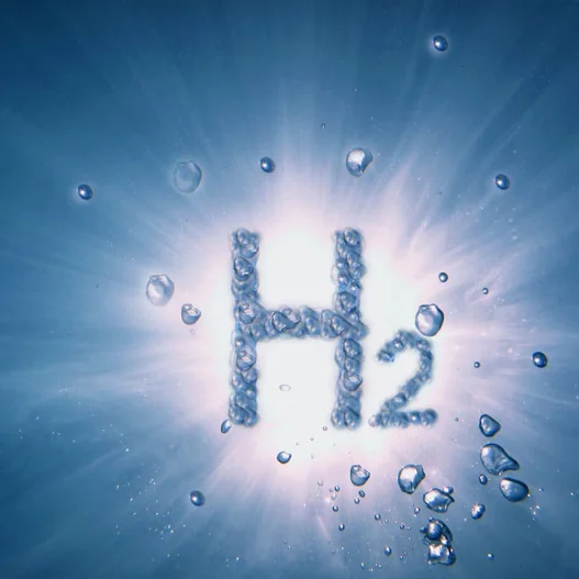 H2 written in bubbles with light shining behind it